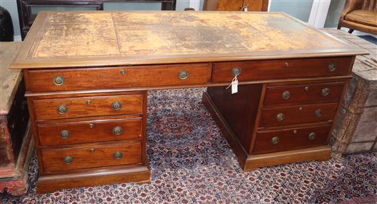 A late 19th century mahogany partners desk fitted drawers and cupboards L.182cm